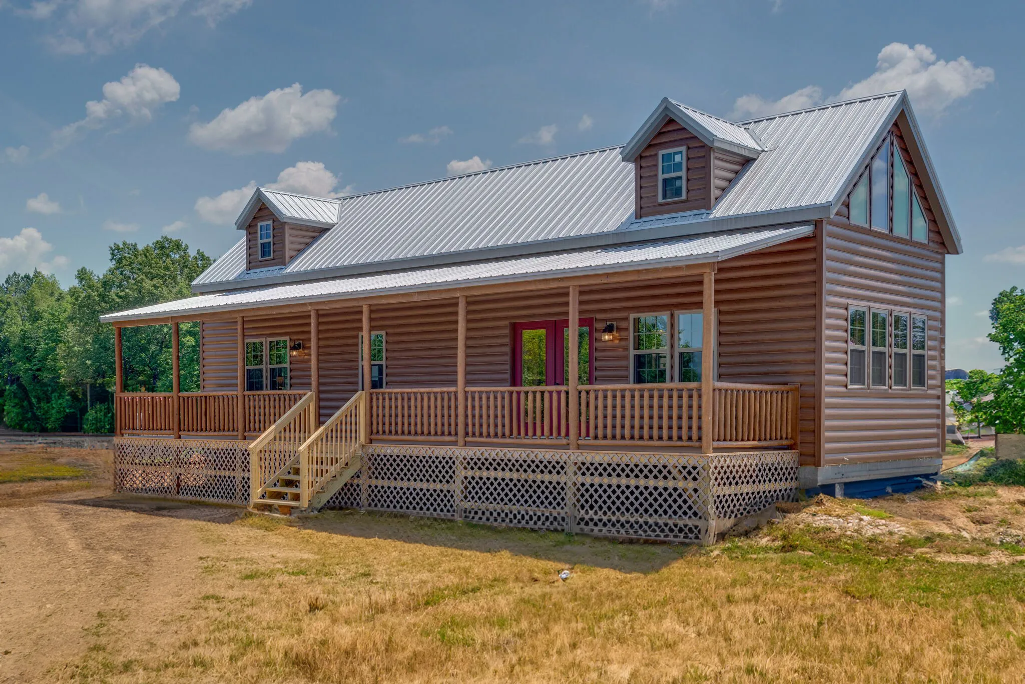 The Laramie modular home with wood siding